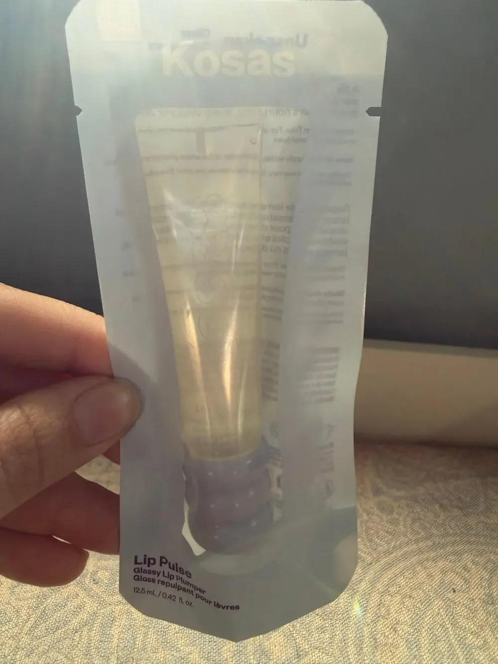 Kosas Lip Pulse Lip Plumper shade unspoken (clear)